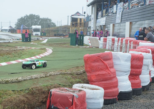 YES, that's a real (full-size) tire wall - at an RC track! This was the Auto Model Club L'Ouest club track in Hanvec/Brest, France for the Large Scale Off Road European Championships!