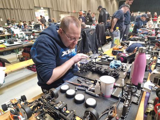 *David Attenborough voice)*
And here we see a Jan Ratheisky in his natural environment, paying extra-close attention, making sure every washer, every bolt, every screw is properly in place before taking to the track... 
Superb job on the Worlds podium, Ja